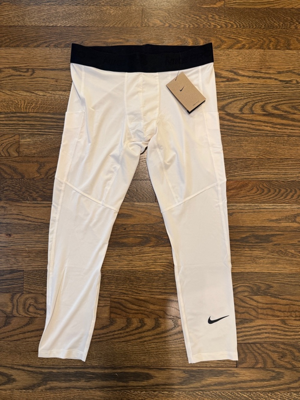 Men’s Nike Cropped White Leggings with Black Waistband and Black Swoosh